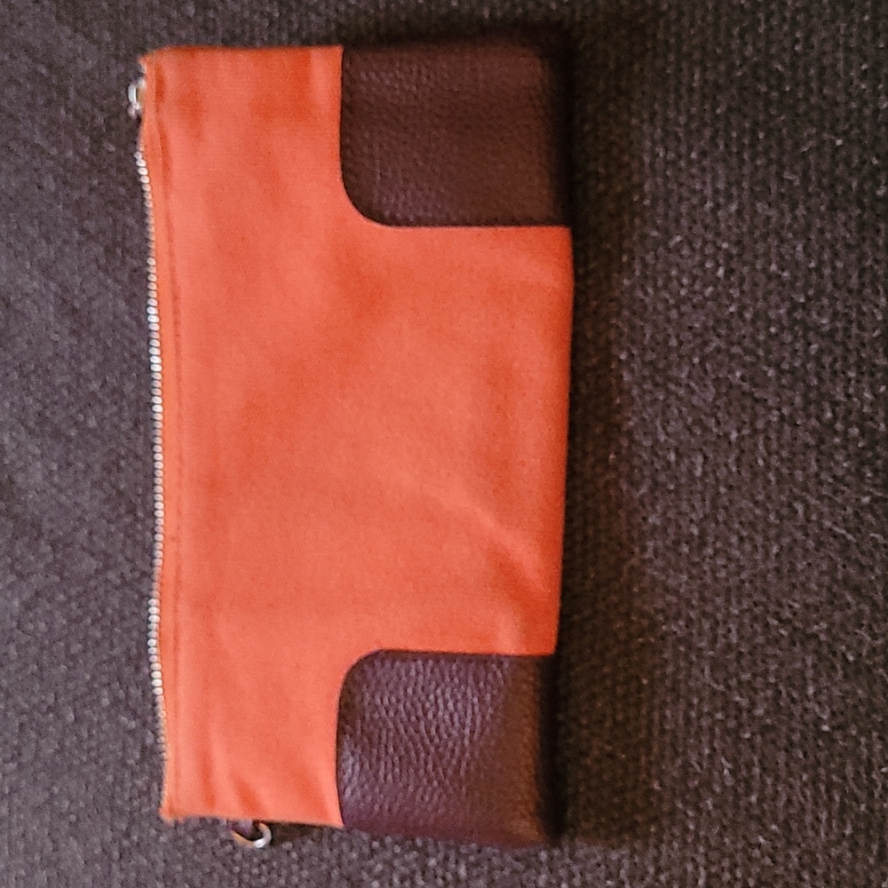 Orange and brown canvas wrislet.